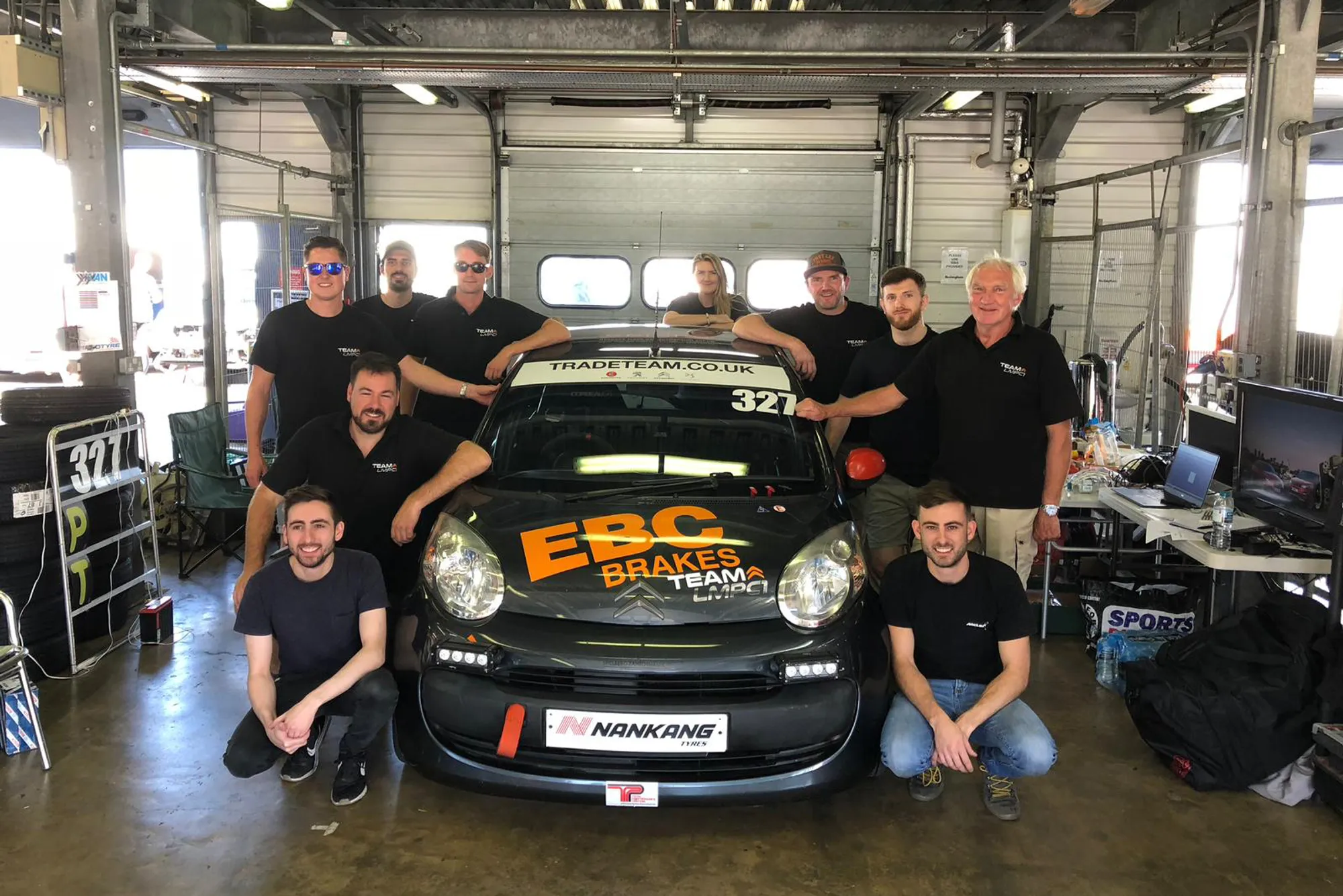 LMPC1 Citroen C1 race team group photograph in Spa Francorchamps pit garage