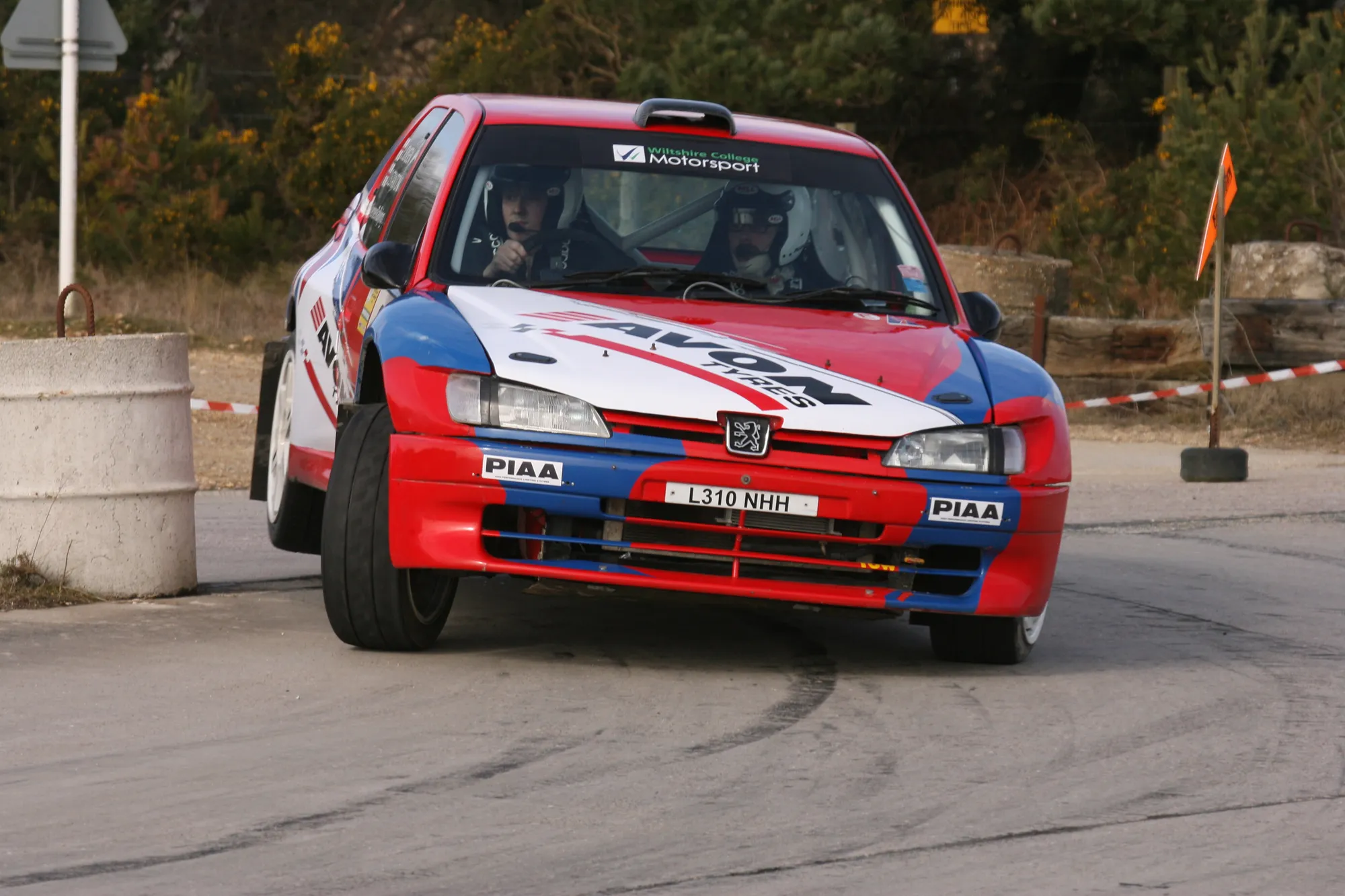 Peugeot 306 Maxi Kit Car on two wheels mid-corner at Bovington Stages rally